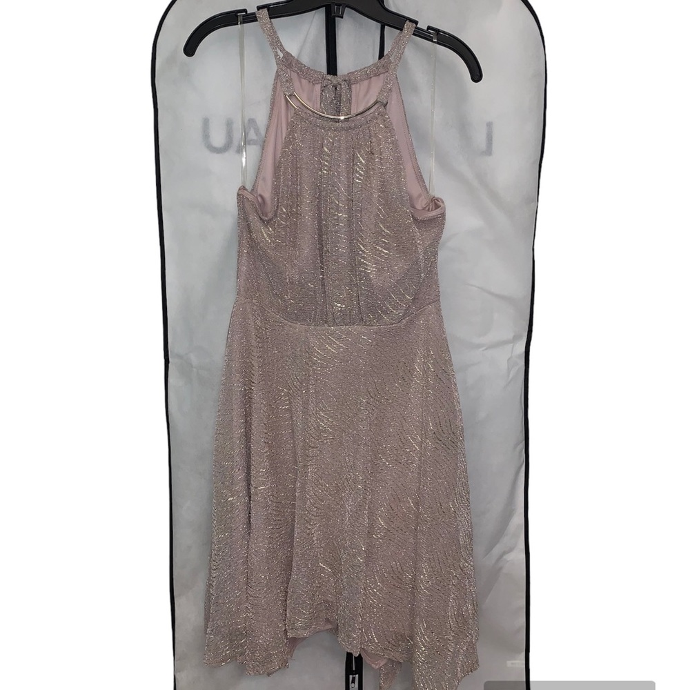 Dress by Le Chateau. Size medium and perfect for any occasion
